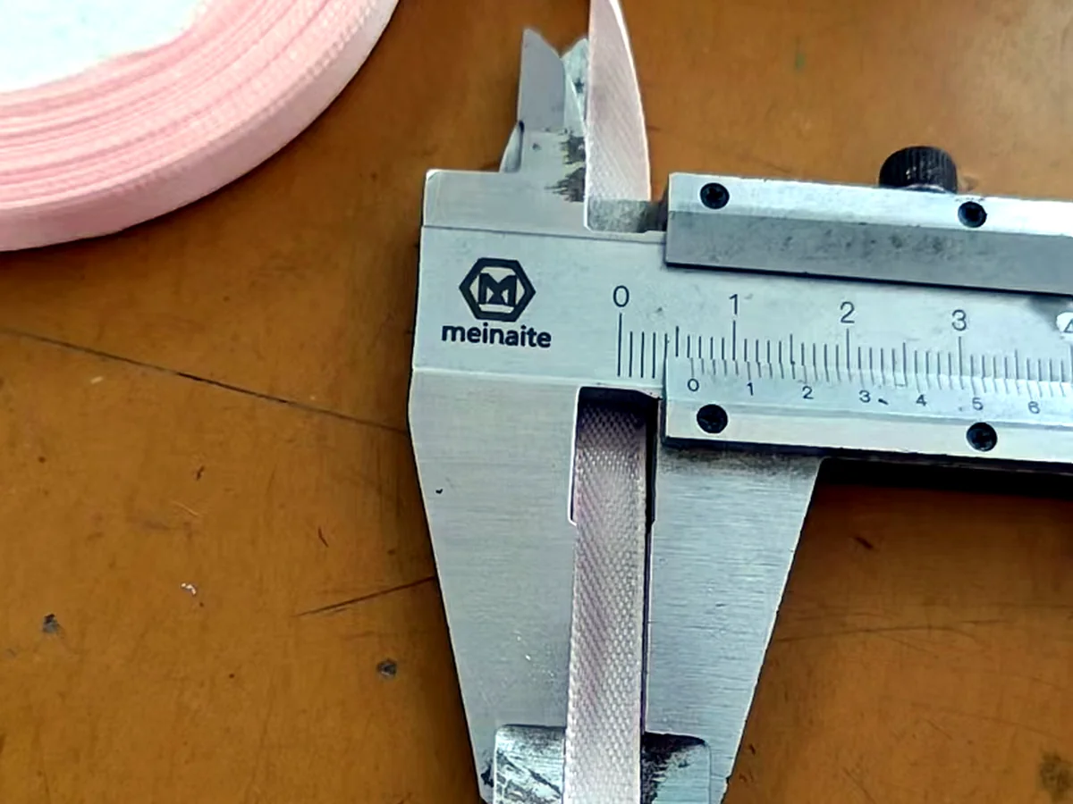 Component thickness inspection using a caliper